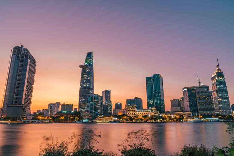 The skyline of Ho Chi Minh City in Viet Nam seen from the harbour at sunset